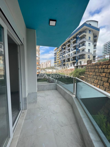 Новые апартаменты 2+1 в популярном районе Махмутлар - Ракурс 10