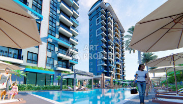 Новые апартаменты 1+1 в комплексе с пятизвездочной инфраструктурой в районе Махмутлар - Ракурс 2