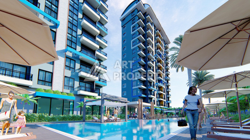 Новые апартаменты 1+1 в комплексе с пятизвездочной инфраструктурой в районе Махмутлар - Ракурс 1