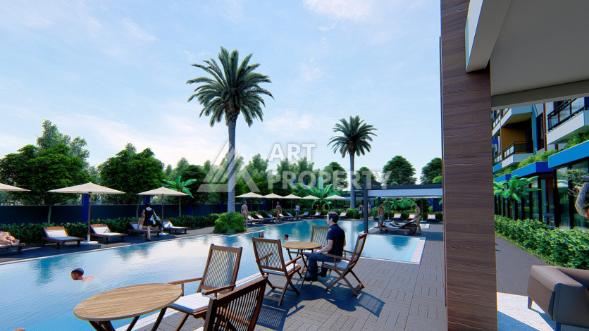 Новые апартаменты 1+1 в комплексе с пятизвездочной инфраструктурой в районе Махмутлар - Ракурс 14