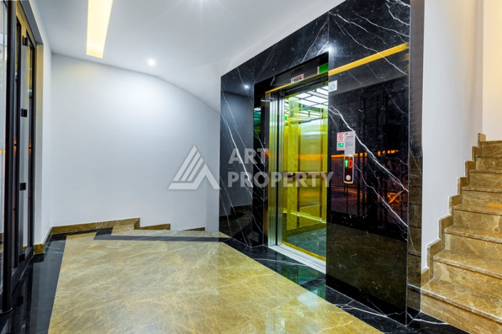 Двухуровневая меблированная квартира 2+1 с собственной инфраструктурой в центре Аланьи - Ракурс 2