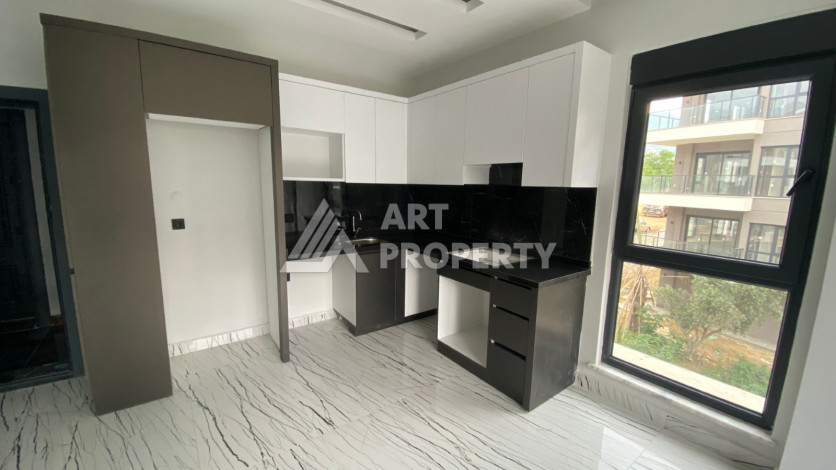 Новые апартаменты 1+1 в ЖК развитого района Оба - Ракурс 6