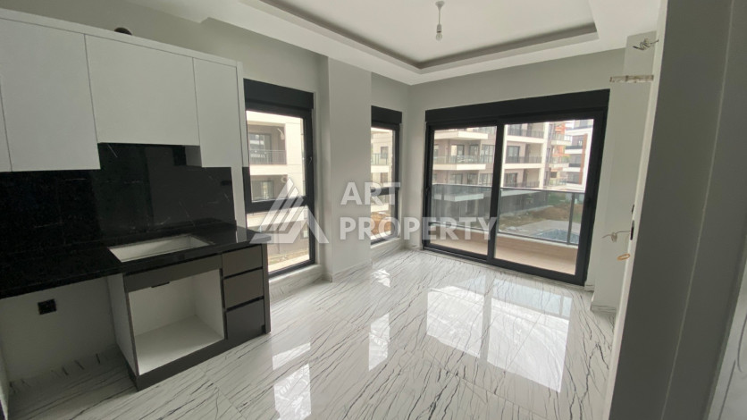 Новые апартаменты 1+1 в ЖК развитого района Оба - Ракурс 7