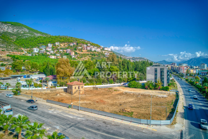 Новый комплекс с большими планировками квартир в самом центре Алании - Ракурс 13