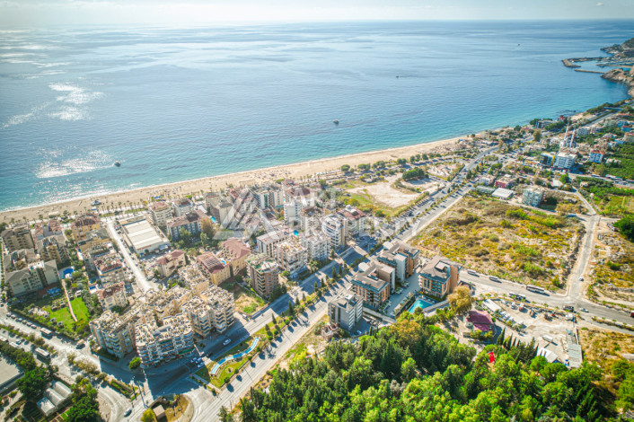 Новый комплекс с большими планировками квартир в самом центре Алании - Ракурс 14