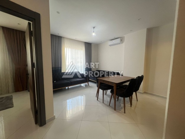 Меблированные апартаменты 1+1 в ЖК класса люкс в развитом районе Махмутлар - Ракурс 11