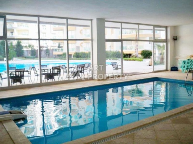 Меблированные апартаменты 2+1 в престижном комплексе развитого района Махмутлар - Ракурс 7