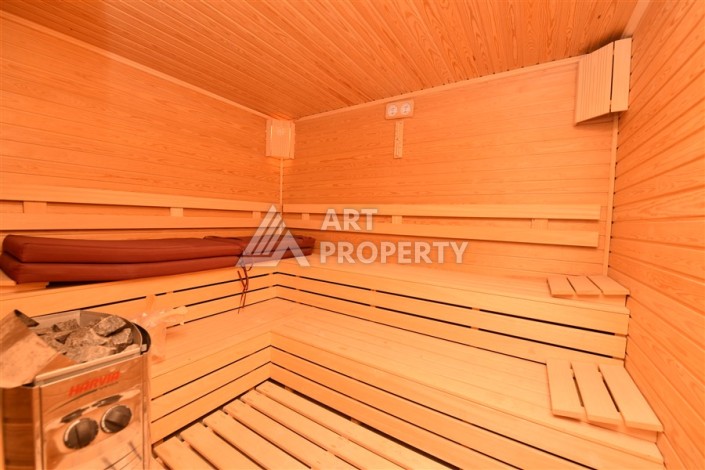 Меблированные апартаменты 2+1 в престижном комплексе развитого района Махмутлар - Ракурс 13