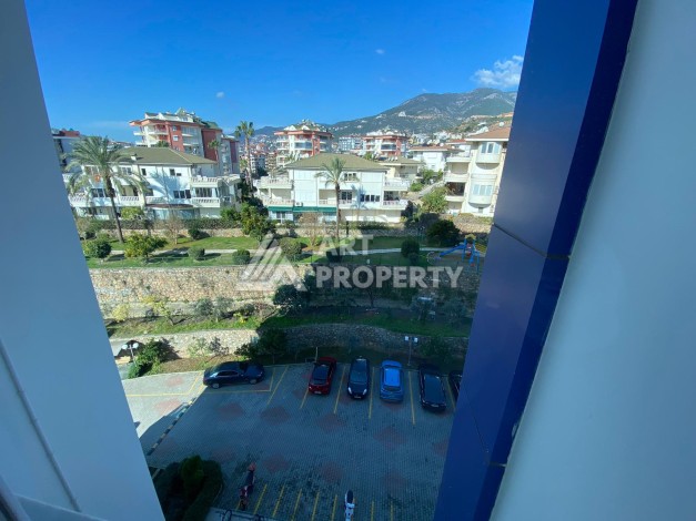 Уютная меблированная квартира 1+1 в районе Джикджилли - Ракурс 6