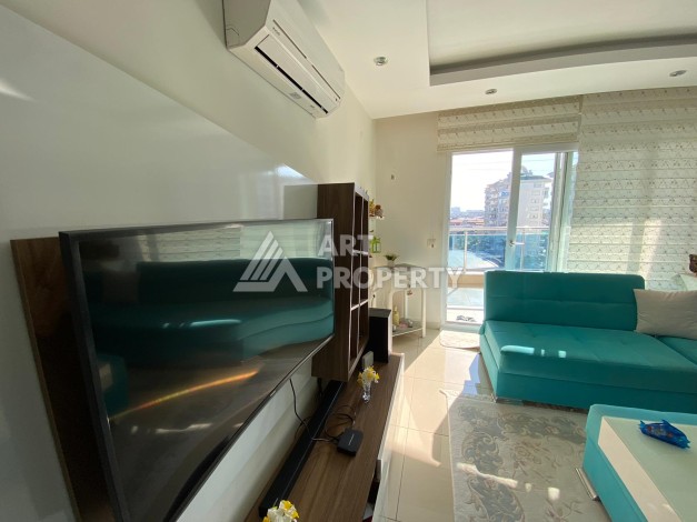 Уютная меблированная квартира 1+1 в районе Джикджилли - Ракурс 10