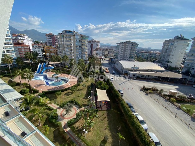 Уютная меблированная квартира 1+1 в районе Джикджилли - Ракурс 15