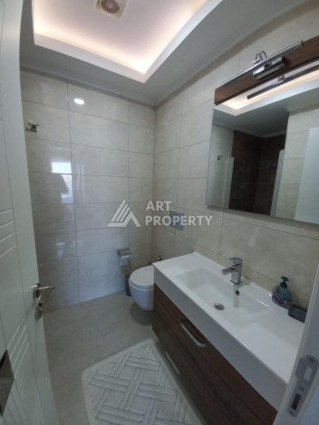 Квартира 1+1 в знаменитом премиальном комплексе в районе Махмутлар - Ракурс 14