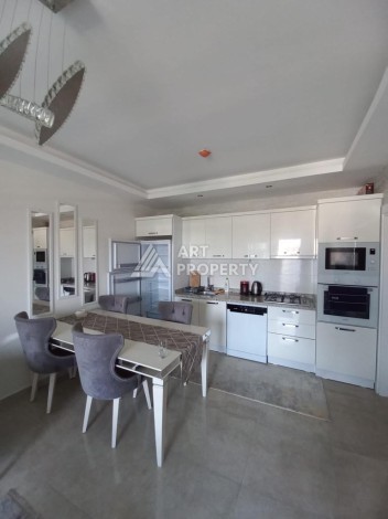 Квартира 1+1 в знаменитом премиальном комплексе в районе Махмутлар - Ракурс 19