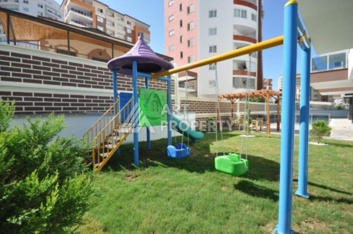 Квартира 1+1 в тихом месте со своей инфраструктурой в районе Махмутлар - Ракурс 3