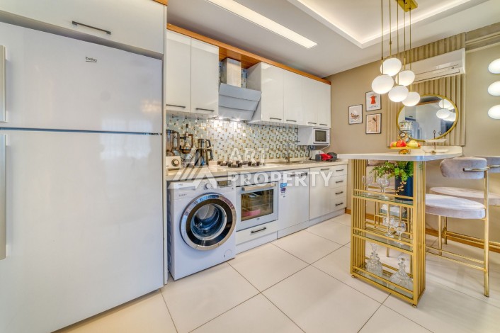 Меблированная квартира 1+1 на улице Ататюрк в Махмутлар - Ракурс 4