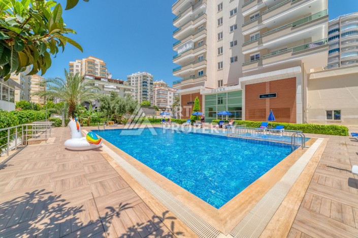 Меблированная квартира 1+1 на улице Ататюрк в Махмутлар - Ракурс 8