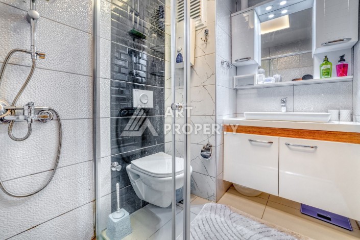 Меблированная квартира 1+1 на улице Ататюрк в Махмутлар - Ракурс 12