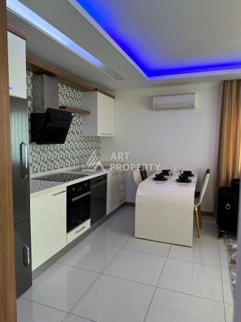 Уютная квартира с мебелью 1+1 по привлекательной цене в районе Махмутлар - Ракурс 1