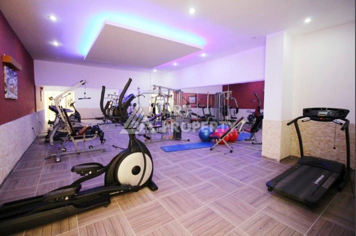 Комфортная квартира 1+1 в комфортном для жизне комплексе в районе Махмутлар - Ракурс 3