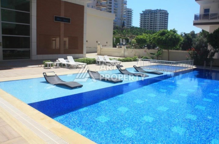 Комфортная квартира 1+1 в комфортном для жизне комплексе в районе Махмутлар - Ракурс 5