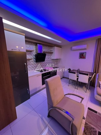 Комфортная квартира 1+1 в комфортном для жизне комплексе в районе Махмутлар - Ракурс 19