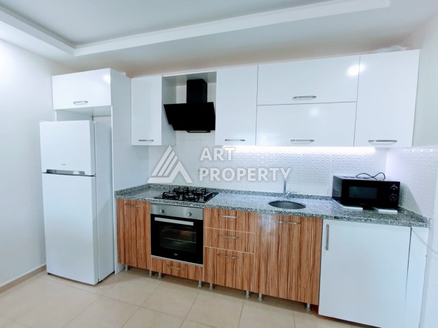 Меблированная квартира 1+1 в малоэтажном комплексе района Махмутлар - Ракурс 11