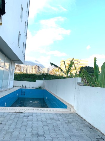 Меблированная квартира 1+1 в малоэтажном комплексе района Махмутлар - Ракурс 18