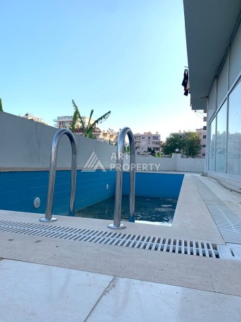 Меблированная квартира 1+1 в малоэтажном комплексе района Махмутлар - Ракурс 19