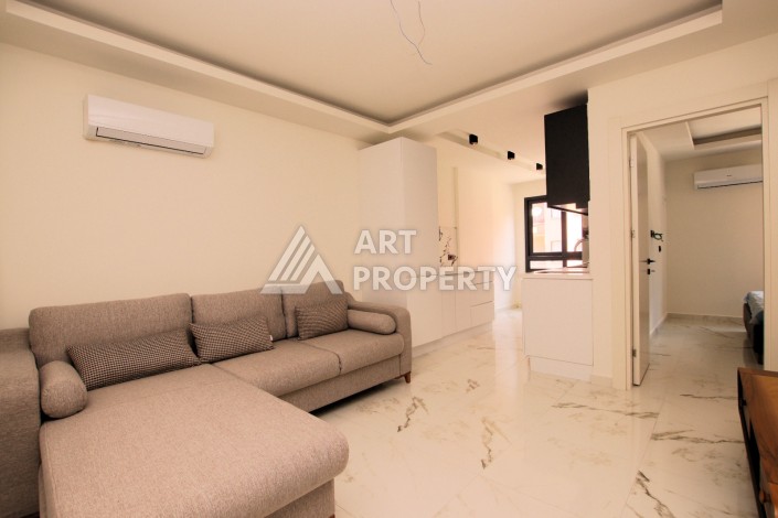 Меблированная квартира 1+1 в новом доме в центре Аланьи - Ракурс 3