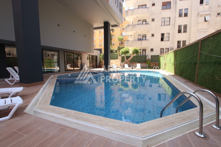 Меблированная квартира 1+1 в новом доме в центре Аланьи - Ракурс 11