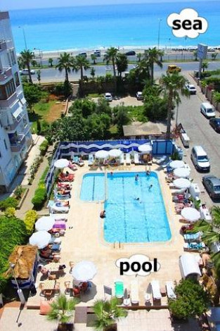 Квартира 3+1 с отдельной кухнейна первой линии от моря, в районе Тосмур, 155 м2 - Ракурс 26