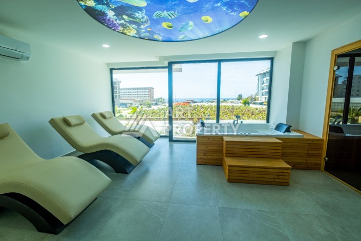 Квартира 1+1 с прямым видом на море в районе Каргыджак! - Ракурс 9