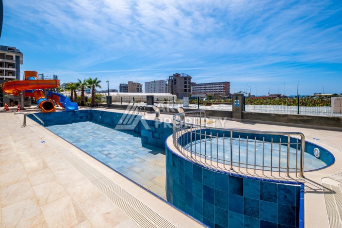 Квартира 1+1 с прямым видом на море в районе Каргыджак! - Ракурс 22