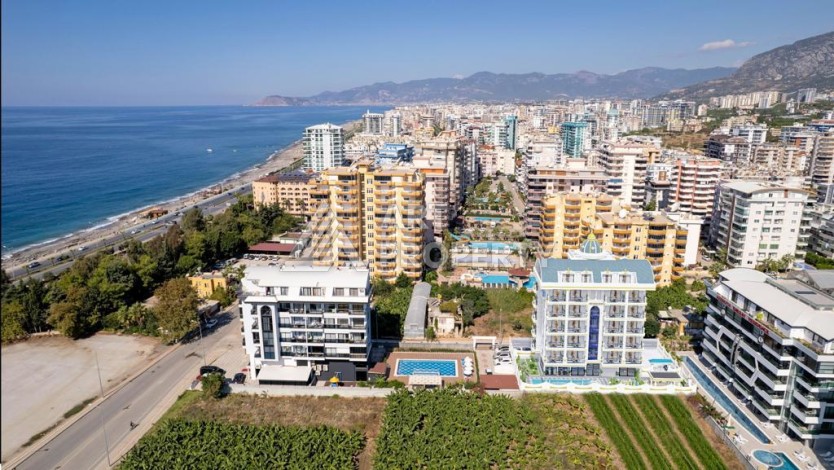 Новый инвестиционный проект на этапе строительства в 150 м от моря в районе Каргыджак! - Ракурс 20