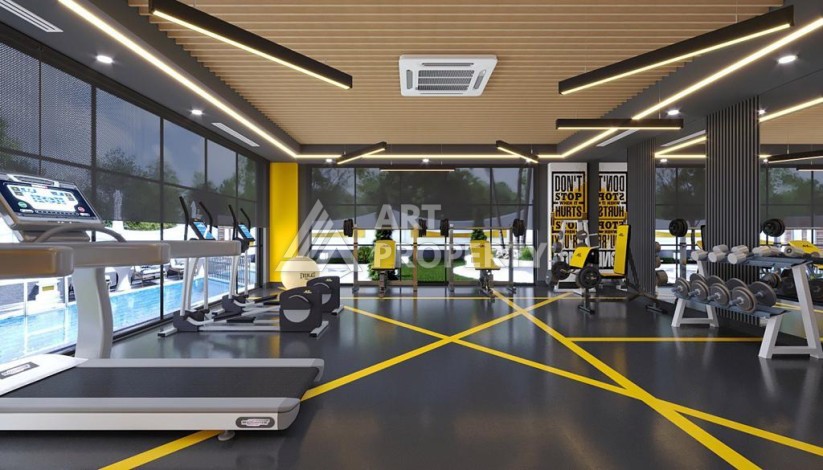 Новый инвестиционный проект на этапе строительства в 150 м от моря в районе Каргыджак! - Ракурс 22