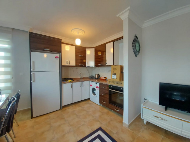 Трехкомнатная квартира в Махмутларе,в 450 метрах от Средиземного моря, 105 м2 - Ракурс 12