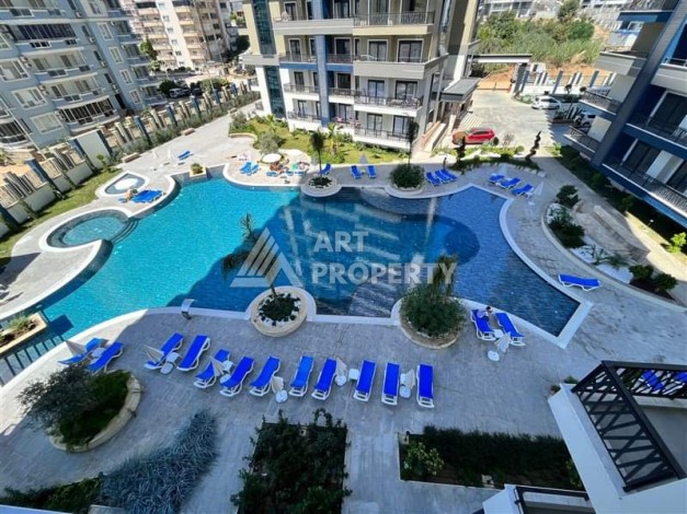 Видовая квартира 1+1 в комплексе с полной инфраструктурой развитого района Махмутлар - Ракурс 4