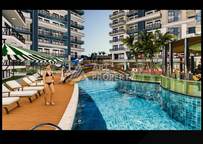 Видовая квартира 1+1 в комплексе с полной инфраструктурой развитого района Махмутлар - Ракурс 6