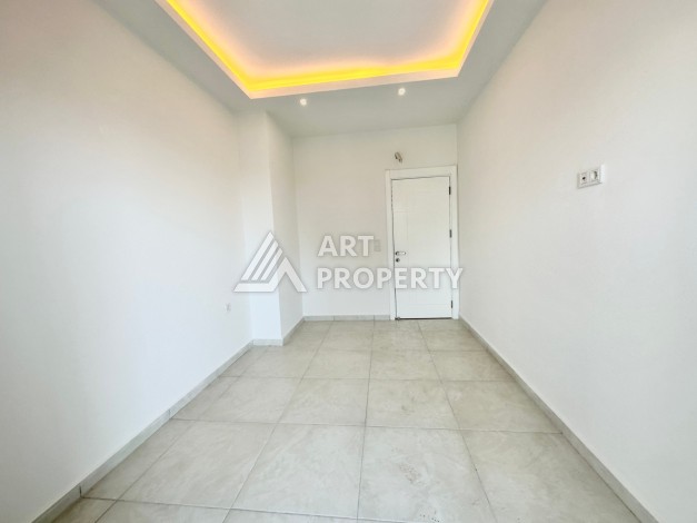 Видовая квартира 1+1 в комплексе с полной инфраструктурой развитого района Махмутлар - Ракурс 12