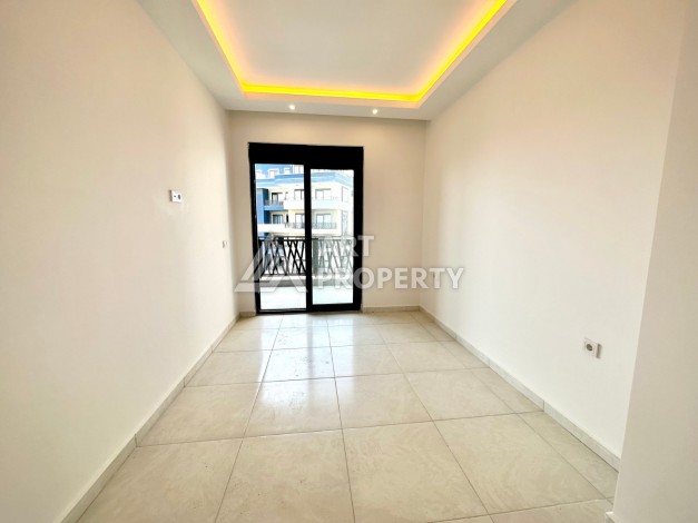 Видовая квартира 1+1 в комплексе с полной инфраструктурой развитого района Махмутлар - Ракурс 13