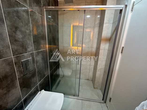 Видовая квартира 1+1 в комплексе с полной инфраструктурой развитого района Махмутлар - Ракурс 16