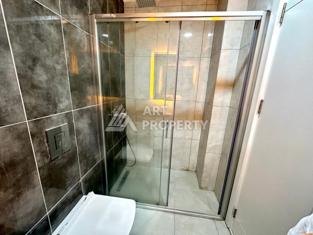 Видовая квартира 1+1 в комплексе с полной инфраструктурой развитого района Махмутлар - Ракурс 17