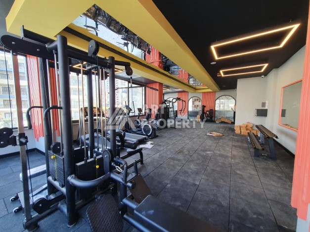 Видовая квартира 1+1 в комплексе с полной инфраструктурой развитого района Махмутлар - Ракурс 21