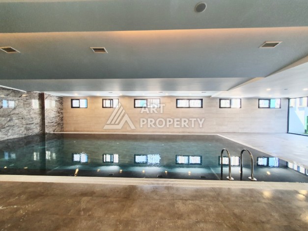 Видовая квартира 1+1 в комплексе с полной инфраструктурой развитого района Махмутлар - Ракурс 25