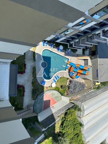 Видовая квартира 1+1 в комплексе с полной инфраструктурой развитого района Махмутлар - Ракурс 28