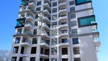 Великолепные апартаменты 3+1 в комплексе с пятизвездочной инфраструктурой развитого района Махмутлар - Ракурс 6