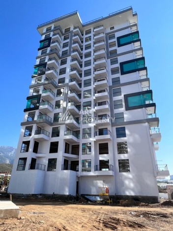 Великолепные апартаменты 3+1 в комплексе с пятизвездочной инфраструктурой развитого района Махмутлар - Ракурс 5