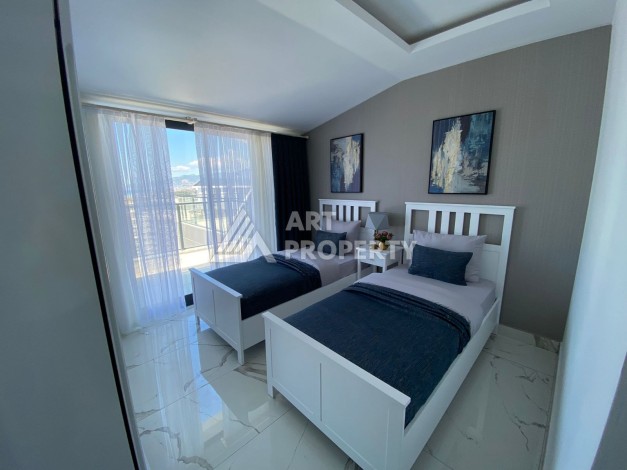 Великолепные апартаменты 3+1 в комплексе с пятизвездочной инфраструктурой развитого района Махмутлар - Ракурс 8