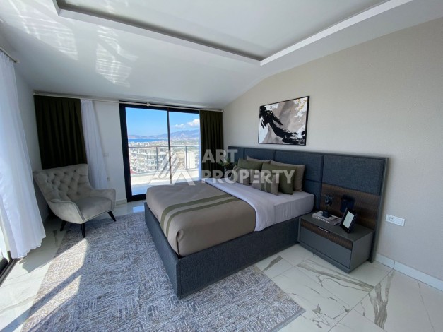 Великолепные апартаменты 3+1 в комплексе с пятизвездочной инфраструктурой развитого района Махмутлар - Ракурс 9