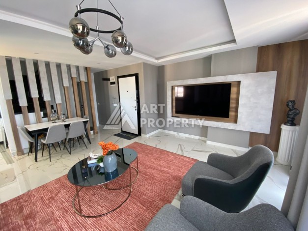 Великолепные апартаменты 3+1 в комплексе с пятизвездочной инфраструктурой развитого района Махмутлар - Ракурс 10